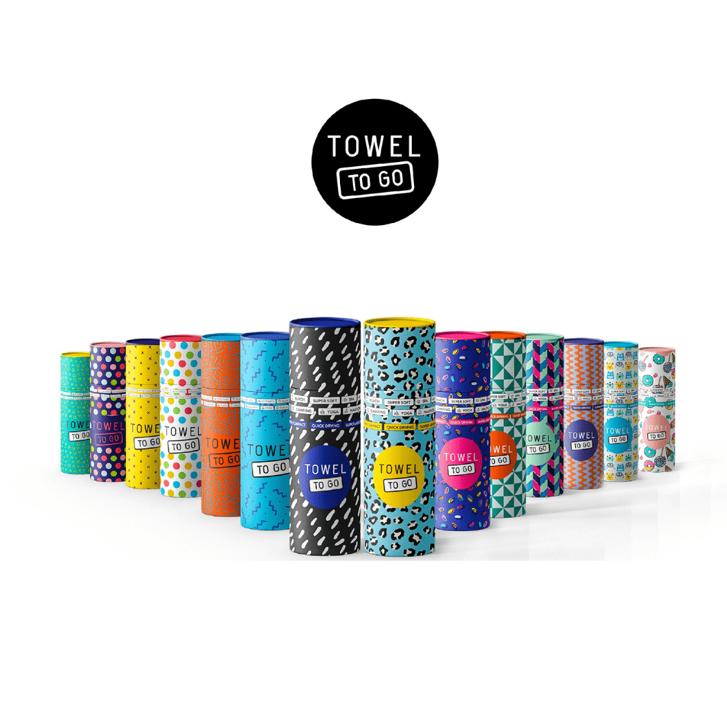 Ipanema Kids Poncho Towel in pink, made from 100% cotton, featuring a hood and packaged in a recycled gift box.